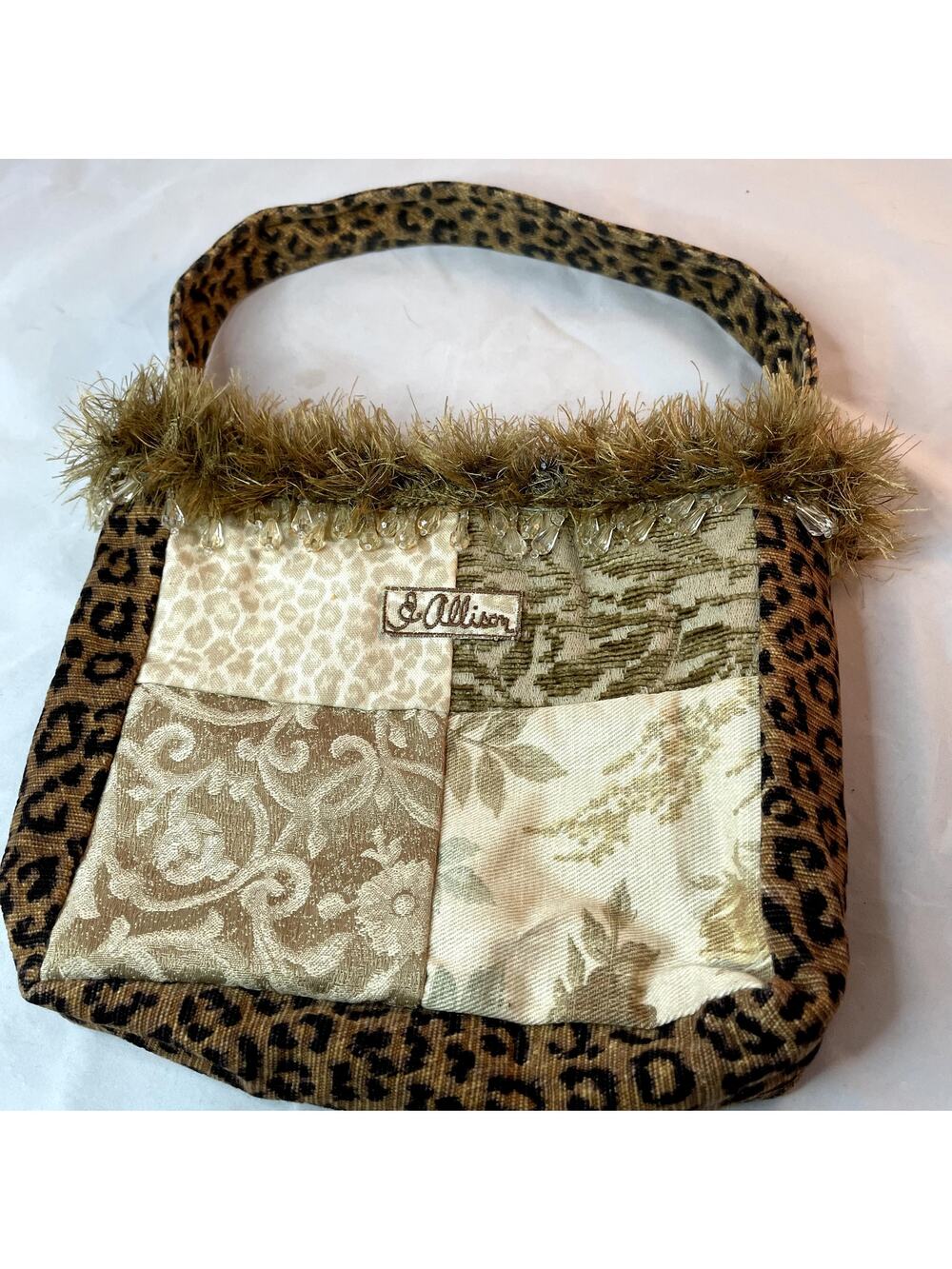 Allison  embroidered on leopard print purse. 10x8x3
